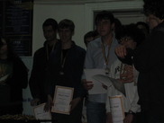 [Andrew C and Jack on stage with their bronze medals]